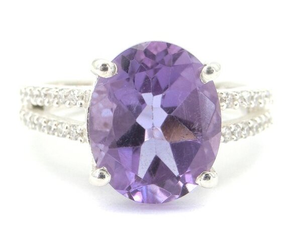 Amethist ring in 925 zilver met topaas steentjes (maat 18)